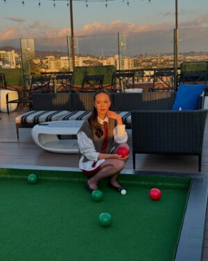 Charlotte Nicdao Instagram - Mythic Quest Season Four starts THIS WEDNESDAY. Please enjoy one serious photo of @danadelaney @claytonhawkins and @lucywarrenstyle ‘s good work, followed by a very silly lawn bowls photo shoot nobody asked for.