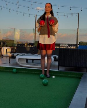 Charlotte Nicdao Instagram - Mythic Quest Season Four starts THIS WEDNESDAY. Please enjoy one serious photo of @danadelaney @claytonhawkins and @lucywarrenstyle ‘s good work, followed by a very silly lawn bowls photo shoot nobody asked for.