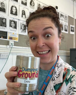 Dani Harmer Instagram - The new series of The Dumping Ground starts TODAY on @cbbc & @bbciplayer can’t wait for you to see this fantastic new series! 
Here’s me in the office during my 1st week being way too overexcited by my coffee mug! 
The episode I directed is episode 8 so enjoy!!!!! 🫶🏻☺️