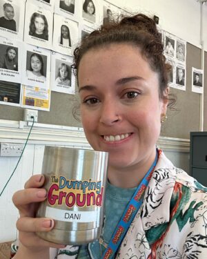 Dani Harmer Instagram - The new series of The Dumping Ground starts TODAY on @cbbc & @bbciplayer can’t wait for you to see this fantastic new series! 
Here’s me in the office during my 1st week being way too overexcited by my coffee mug! 
The episode I directed is episode 8 so enjoy!!!!! 🫶🏻☺️