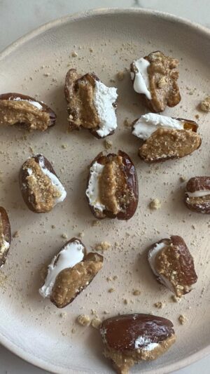 Dina Deleasa Instagram - These Peanutbutter Fluff Dates are what I need around 2pm when I have had enough for the day …but still have a whole half of the day to go, haha! I take a deep breath and take a minute to have a small treat some days. It helps me take a moment and step back from the edge. A simple gesture I offer myself that goes a long way !

The “Mom Minute” chapter is all about that. Recipes I made up for myself with Sienas leftovers, like Cereal Milk Smoothies. Or quick and easy recipes that encourage us to take a minute to feed ourselves alongside our kiddos.

When I was brainstorming how to structure the chapters , I sat down and thought through how I was moving and cooking through the week. In between after school activities, 20-30 minutes to make dinner, pulling from the pantry. And really everything in between!

I can’t wait to share more! I will doing an IG live soon, giving you a book tour ! Thank you so much for your pre-orders and excitement. It really makes a world of difference!

#atthekitchensink #cookbookcorner #familydinner #easyrecipesformoms