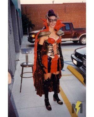 Hilary Shepard Instagram - Viva la Diva! 🏴‍☠️ Hilary Shepard tries on the Pirate Queen Divatox’s complete in-progress costume for Turbo: A Power Rangers Movie.

Behind-the-scenes photos from designer Kenneth J. Hall reveal costume tests / fittings with Hilary Shepard Turner outside Total Fabrication, Inc. in North Hollywood, CA circa 1996. This version of Divatox was styled for the Turbo movie, while a version with modesty modifications was tailored for the series. In addition to Divatox’s costume, Hall and his company were also responsible for the designs and fabrication of the Putra Pod Monsters and Divatox’s Warriors / Pirhanatrons.

Can you spot the minor costume differences between these two photos?

#MorphinMuseum Exhibit 0782 ⚡️
Series: #TurboAPowerRangersMovie
Year: 1997

#powerrangers #morphintime #rangernation #sentai #supersentai #rangerhistory #gogopowerrangers #foxkids #itsmorphintime #legendarypowerrangers #powerrangerslegacy #ilovepowerrangers #thisispowerrangers #powerrangersturbo #shiftintoturbo #divatox #hilaryshepard