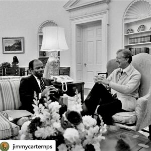 Isabel Wilkerson Instagram - What was Jimmy Carter trying to teach us in taking his final bow at this pivotal moment in America? That there is, in fact, goodness and decency in the world when we fret that there is none. That even out of power, and perhaps especially more so out of power, people can do great good in the world, if we can find our purpose and calling. That wise and measured sacrifices on behalf of the whole, as with the restraint shown during the Iranian hostage crisis which ultimately yielded their safe release, can achieve the desired goal, or that visionary moves that may seem quirky at the time, like solar panels on the White House way back in the 1970’s, may take decades to be affirmed, but affirmed they will be. That patience, kindness, compassion and tenacity are superpowers that take time to bear fruit, but last beyond the whims of any moment and can have more power than naked dominance. 

Who would not want the genuine, abiding love that he and Rosalynn had, that perhaps few people ever truly get to know, that lasted longer than many people get to live, or the long and purposeful life he himself achieved.  He offered all of us a redefinition of success on his own terms. 
By his actions in defeat, he singularly forced a reassessment of his presidency and of his role in history, assuring that he will be remembered longer than his one term in the White House would suggest on its own.  Which is why regular folks in Washington, D.C., lined up in the bitter cold and waited for hours to pay their respects to him, as his remains laid in state in the capitol rotunda last night. He taught us that defeat is not the end but the beginning. He left us a blueprint for how to harness life’s disappointments into the greatest and longest lasting gifts for ourselves and for the world. 
——
Slide 1: Rosalynn Carter, Andrew Young, Coretta Scott King, Jimmy Carter
Slide 2: With John Lewis
Slide 3: Carter on MLK’s legacy
Slides 4, 5: With Rosalynn Carter
Slide 8: Greeting every passenger on a Delta Airlines flight, as was his way
Slides 9, 10: People lined up in DC, via Joy Reid