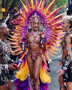 Jourdan Dunn Instagram - Carnival Chronicles 🩷🧡💛💜

Costume design @eccdesigner 
Band @ucomcarnival 
📸 @luceroglow
