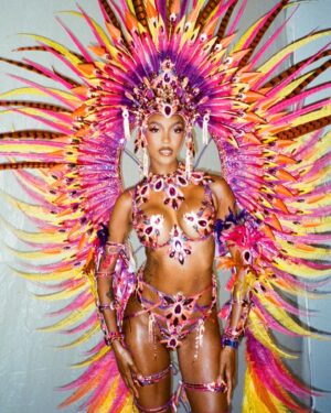 Jourdan Dunn Instagram - Carnival Chronicles 🩷🧡💛💜

Costume design @eccdesigner 
Band @ucomcarnival 
📸 @luceroglow