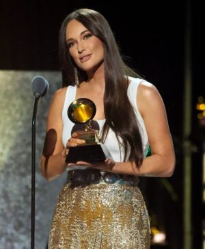 Kacey Musgraves Instagram - “Sweet and divine”. Thank you, Architect. 🤍 

Thank you to my team, the @recordingacademy and to @shanemcanally   @joshosbornesongwriter for writing this song with me.

makeup: @moanilee 
hair: @giovannidelgado 
wardrobe: @maddielouviere x @ralphlauren 
earrings: indigenous made! By @ataumbimetals