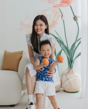 Kimberly Chia Instagram - Another CNY tradition down!🧧 I really love family photoshoots 🥹 all these memories that we can look back on many years down the road.

@orangestudios , you guys made Kyzen laugh so much! His happy face is all I need to put a smile on mine 🥰

Kyzen and I both wearing @lepetitsociety 🤭
