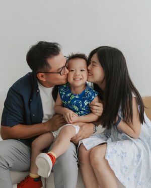 Kimberly Chia Instagram - Another CNY tradition down!🧧 I really love family photoshoots 🥹 all these memories that we can look back on many years down the road.

@orangestudios , you guys made Kyzen laugh so much! His happy face is all I need to put a smile on mine 🥰

Kyzen and I both wearing @lepetitsociety 🤭