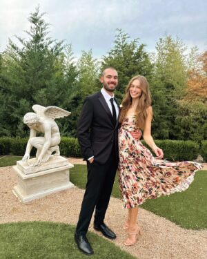 Lani Randol Instagram - This photo should not be considered any sort of proof that I do, indeed, step on Garrett’s toes as he so claims I often do, ruining many of his beloved shoes. 

It should, however, be considered a congratulatory post for my bro @maverickbaker & @thekenziebree who are officially Mr. & Mrs. Baker 💍🥂 We love you two dearly and so thrilled to have the Baker bunch complete 🖤 

Also… is this considered hard launching Garrett’s new look? 

#wedding #married #weddingguestdress #love