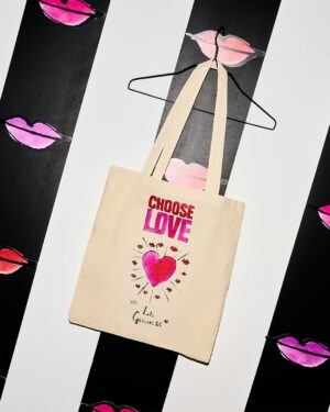 Laura Whitmore Instagram - We’re SO excited to show off this gorgeous collaboration with @lulu_guinness and @TheWhitmore 💖💖💖

For Valentine’s Day, Lulu Guinness chose love by supporting our work with refugees and displaced people all around the world.

Lulu Guinness has designed an iconic hand-drawn T-shirt and tote bag celebrating and spreading the Choose Love message. All proceeds from this very special T-shirt and tote bag, as well as 30% of proceeds from the ‘Lips’ clutch collection will be donated directly to our work, supporting those who need it most.

Huge thanks to the amazing Lulu Guinness team for their incredible generosity and stunning style, and our friend and long-term supporter, Laura Whitmore for fronting the campaign. 

Choose Love this February, and look great while doing it, by shopping the collection at the link in our bio.

Everything you buy makes a huge difference 💖