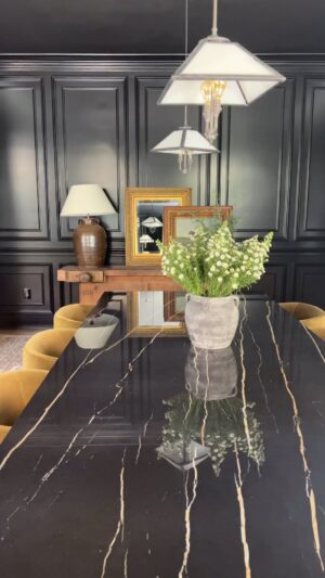 Lauren Liess Instagram - Mixing it all in our #foxvalefarmproject 🖤 Glossy black mouldings   marble table with warm velvet and primitive antiques   art spanning from a hundred years old to freshly painted ✨ | Interior design by us @laurenliessandco | Renovation by @carrmichaelconstruction | featuring one of my favorite paintings everrrr (second shot with the large dripping landscape) by @lauren_rose_jackson_art
