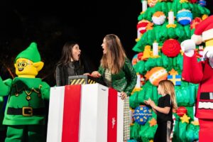 Lyndsy Fonseca Instagram - Holiday cheer is HERE at #LEGOLANDCalifornia 🎄✨

Fireworks filled the sky and snow flurried onto the crowd as @HallmarkChannel stars @daniellamonet and @lyndsyfonesca helped LEGO Santa light the LEGO Christmas tree!

❤️ We proudly donated $10K to Move With Kindness Foundation founded by @allisonholker and honors the legacy of Stephen tWitch Boss by spreading love and mental health awareness.

🎆 Celebrate the season with us now through Jan. 5, including fireworks every Saturday in December & nightly Dec. 21–30!

📸 Don’t forget to tag us in your holiday pics with #LEGOLANDHolidays 

Click the 🔗 in bio for more info! 

#LEGOLANDCalifornia #LEGOLAND #Holidays #Christmas #LEGO