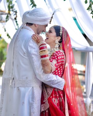Megha Chakraborty Instagram - “Our dream wedding outfits brought to life by the incredible team at @adyaaye_official ✨❤️

Megha’s stunning lehenga and my regal sherwani were nothing short of perfection—crafted with elegance, detail, and so much love. Adyaaye truly made us feel like royalty on our special day! 👑

Thank you for making our vision come true and for adding so much beauty to our celebration. Highly recommend Adyaaye for anyone looking to make their big day unforgettable!

Beautiful captured by : @focusweddingphotographers 
MUA : @nehaadhvikmahajan 
Outfits : @adyaaye_official 

#Adyaaye #WeddingOutfits #DreamComeTrue #SahilMeghaWedding #mehil