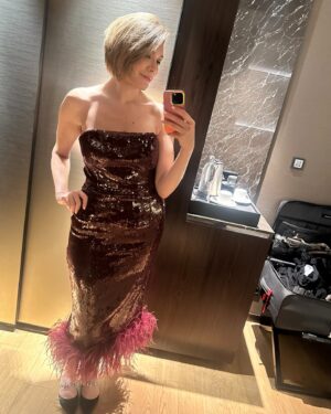 Michelle Collins Instagram - Happy New Year from me aka Ljubljana Grande, this spectacular fireworks show, the chaos of my TK Maxx 29” spinner, and my sequined dress which cut into my skin like 1,000 razor blades ❤️🎉🥂 Highly recommend Slovenian NYE by the way, we’ve had the best time 🇸🇮 here’s to all the best things in 2025 let’s manifest as a family!!
