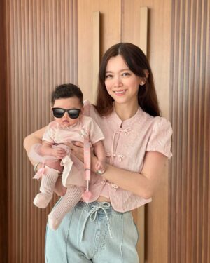 Natalia Ng Instagram - Every year got fish! 🎏 Literally…🤪 #twoundertwo 

Wishing everyone a fang-tastic 🐍 year filled with venom-ous laughter, zero hiss-fits, and enough s-s-s-style to make Medusa jealous 🥶 

All of us decked in CNY fits from @padini_my ❤️