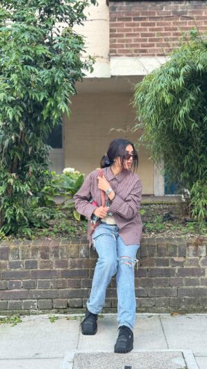 Neeha Riyaz Instagram - GRWM ~ ….✨ 

Cleanser: @cerave 
Toner: @pixibeauty 
Moisturiser: @lorealparis 

Oversized shirt & boots: @stagmenfashion 
Crochet crop top: @vienna_thecollective 
Jeans: @hm 
Vintage bag: @eiaro_ 
Shades: @sheinofficial 
Concealer: @toofaced 
Setting powder: @hudabeauty 
Mascara: @maybelline 
Lipstick: @sephorauk 

Perfume: @gucci 

#grwm #grwmmakeup #styling #fashion #fashionstyle #fashionblogger #streetstyle #influencer #contentcreator #fashiontips