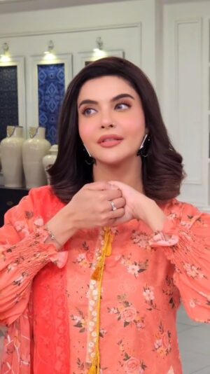Nida Yasir Instagram - Tangerine luxury lawn chickenkari with chiffon embroidered duppatta.bright and printed with only one slit and smoking balloon sleeves ready to face this summer
@ynida.clothing