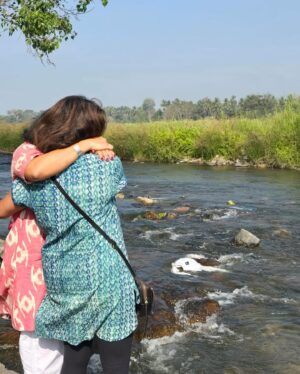 Pramila Jayapal Instagram - One week ago, my sister and I immersed my father’s ashes in the Cauvery River in India. He was 93 and passed away peacefully. Clearing out his stuff, I am reminded of who he was. He and my mother loved parties, dancing & entertaining. He loved singing & would often call us and sing Stevie Wonder’s “I just called to say I love you.” He was super competitive, played endless games of Phase 10 and hated to lose—even to the kids! He was a perfectionist, demanding order in everything, even folding laundry before he put it in the wash. He couldn’t throw anything away, so his closets were full of empty little boxes, airline freebies, even broken suitcases. He got sustenance from daily 60-90 minute walks, rain or shine, at a pace that had us running to keep up. He was loyal & would help anyone in need. He possessed a genius math/engineering mind, scoring at the top of the all-India exams, setting ambitious goals and meeting them. When he and my mom moved to Indonesia in 1969, they charted new territory in an unknown place. He travelled for work & then more with mom following her passions. He supported my mother’s many careers as teacher, author and counselor. He believed completely in education, and that his daughters could achieve anything with it. Unlike many of his era who wanted to have sons, he always wanted daughters. He sent us away to college in America at 16 when he had nothing in the bank, because he wanted us to have all the opportunities available. I don’t think there was much thought to how we would never live on the same continent as them again. As we all came to realize, children being far away as their parents age is but one of the prices of migration. It wasn’t all perfect—like everyone, he had flaws & we had our rough patches. But as I sift through all the memories, I see how much of him is also in me and I am grateful. As we put his ashes in the beautiful rushing river, sky above as blue and clear as could be, trees swaying, it was the perfect place & moment to send him on his final journey. While the hole in my heart is there, it is now growing the flowers of memory & gratitude for all he was. Om Shanti, dearest Papa. May your soul attain moksha. ❤️