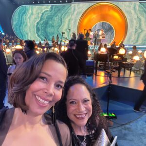 Rhiannon Giddens Instagram - I will be posting black history/excellence posts again for sure. Just wanted to report back on my little corner of the GRAMMYs, which happened yesterday.  I was nominated for Best American Roots Performance, for the recording of “The Ballad of Sally Anne”, a heartbreaking song about a lynching, which I recorded in Ireland with Francesco Turrisi and Ben Rawlins, and was finished by Ebonie Smith, for Fiona Prine’s Oh Boy Records. It was written by Alice Randall, who has been working in Nashville for over 40 years, writing anthems for black women while there weren’t many of us allowed into the establishment to sing them.  That was our win; the trophy itself went to someone else and that’s fine by me! There’s room for us all.

I took Alice as my date and we had a ball dropping nuggets of knowledge all down the red carpet, with my banjo in tow 🙂 (yes the 1858-replica banjo that graced the album of the year with its deep funky sounds... ) 

For me, being involved in this deeply cultural music is more than a career, it’s more than an album, it’s more than a single.  It’s a mission to show how beautiful Americans can actually be together; it’s proof that we are more alike than we are different, and it’s a study in how we do not need a hyphen; if anything, American history itself needs a hyphen.  We are America; America is us.  And the groundwork that the folks before us laid, like Linda Martell yes, but also Lil Hardin, and Libba Cotten, and Joe Thompson, and Ray Charles; and folks laying all the groundwork right NOW, like Rissi Palmer, and Dena Ross Jennings, and Angela Wellman, and so many others, educating and welcoming and doing all the active things you do to build real community.  It takes time; it takes humility; it takes interest in other people and other people’s success.

For me, saying their names, all of them, makes me feel grounded.  For me, acknowledging that I would not be here without them, makes me feel stronger.  The rising tide lifts all boats.