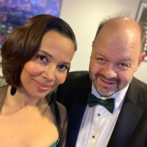 Rhiannon Giddens Instagram - I will be posting black history/excellence posts again for sure. Just wanted to report back on my little corner of the GRAMMYs, which happened yesterday.  I was nominated for Best American Roots Performance, for the recording of “The Ballad of Sally Anne”, a heartbreaking song about a lynching, which I recorded in Ireland with Francesco Turrisi and Ben Rawlins, and was finished by Ebonie Smith, for Fiona Prine’s Oh Boy Records. It was written by Alice Randall, who has been working in Nashville for over 40 years, writing anthems for black women while there weren’t many of us allowed into the establishment to sing them.  That was our win; the trophy itself went to someone else and that’s fine by me! There’s room for us all.

I took Alice as my date and we had a ball dropping nuggets of knowledge all down the red carpet, with my banjo in tow 🙂 (yes the 1858-replica banjo that graced the album of the year with its deep funky sounds... ) 

For me, being involved in this deeply cultural music is more than a career, it’s more than an album, it’s more than a single.  It’s a mission to show how beautiful Americans can actually be together; it’s proof that we are more alike than we are different, and it’s a study in how we do not need a hyphen; if anything, American history itself needs a hyphen.  We are America; America is us.  And the groundwork that the folks before us laid, like Linda Martell yes, but also Lil Hardin, and Libba Cotten, and Joe Thompson, and Ray Charles; and folks laying all the groundwork right NOW, like Rissi Palmer, and Dena Ross Jennings, and Angela Wellman, and so many others, educating and welcoming and doing all the active things you do to build real community.  It takes time; it takes humility; it takes interest in other people and other people’s success.

For me, saying their names, all of them, makes me feel grounded.  For me, acknowledging that I would not be here without them, makes me feel stronger.  The rising tide lifts all boats.