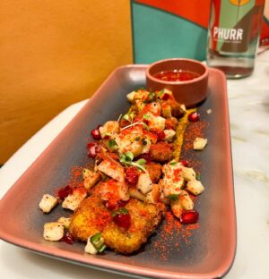 Rumana Nazarali Instagram - A premium fine dining vegetarian restaurant which is always running houseful is a place to dine in #SouthBengaluru if you are looking to enjoy veg food with vegan and Jain options

The food taste good and the portions size is great too, one main course can be easily shared between 2 people. The service is pretty quick and you can rely on staff suggestion for the menu too.

•Loved the complimentary palate cleanser which was coconut-y in taste (I need more🤣)
•I thoroughly enjoyed the soups - Vegetable lemon pepper soup with summer rolls, spicy manchow soup with noodle bhel - half portion is a great choice than sharing one soup between 2 people
•Opted for Gongura Broccoli but the staff suggested us to try the one with hummus and we did not regret it. The hummus helped to lower the heat from the spicy broccoli.
•The staff also suggested us to try an off-the-menu and today’s special appetiser with tender coconut and it hit the spot, it was mild and flavourful.
•Cream cheese wonton with tomato salsa and cheese sauce is another great mild appetiser to enjoy
•Phurr Khao Suey was delicious and the portion size is good for sharing.
•For dessert, I had to try Phurrrrr which was my main reason to visit @phurr.ind . Lucknowi Malaiyo was light and airy, you can control the sweetness level with the quantity of khoya crumb. This should be your dessert order.
•Mocktails look amazing but I would skip it for my next visit.

Make a reservation for your visit, else you would be waiting for an hour or more for a table.