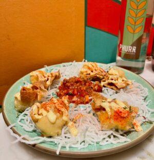 Rumana Nazarali Instagram - A premium fine dining vegetarian restaurant which is always running houseful is a place to dine in #SouthBengaluru if you are looking to enjoy veg food with vegan and Jain options

The food taste good and the portions size is great too, one main course can be easily shared between 2 people. The service is pretty quick and you can rely on staff suggestion for the menu too.

•Loved the complimentary palate cleanser which was coconut-y in taste (I need more🤣)
•I thoroughly enjoyed the soups - Vegetable lemon pepper soup with summer rolls, spicy manchow soup with noodle bhel - half portion is a great choice than sharing one soup between 2 people
•Opted for Gongura Broccoli but the staff suggested us to try the one with hummus and we did not regret it. The hummus helped to lower the heat from the spicy broccoli.
•The staff also suggested us to try an off-the-menu and today’s special appetiser with tender coconut and it hit the spot, it was mild and flavourful.
•Cream cheese wonton with tomato salsa and cheese sauce is another great mild appetiser to enjoy
•Phurr Khao Suey was delicious and the portion size is good for sharing.
•For dessert, I had to try Phurrrrr which was my main reason to visit @phurr.ind . Lucknowi Malaiyo was light and airy, you can control the sweetness level with the quantity of khoya crumb. This should be your dessert order.
•Mocktails look amazing but I would skip it for my next visit.

Make a reservation for your visit, else you would be waiting for an hour or more for a table.