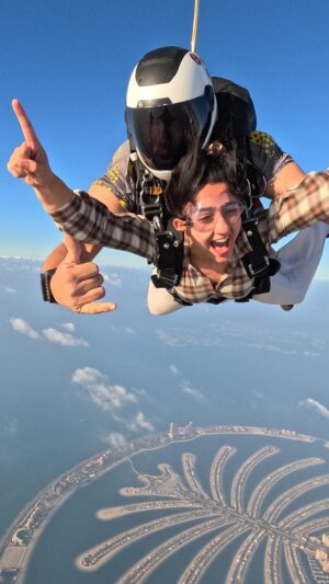 Sanjeeta Bhattacharya Instagram - WILD DECISIONS ONLY! 
13,000 ft over the Palm, Dubai with my man, Fred from @skydivedubai 🌴 

Booked through only the best : @headout 💜

#skydive #skydivedubai