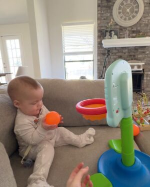 Sara Dietschy Instagram - I could write a caption as long as a book describing what happened the night you were born. The brutal week leading up to that day. The 2 months in the NICU. The moments of despair sitting in bed alone pumping without you in my tummy but also without you next to me. I had no idea what to expect. 

However — I’m making a conscious effort to leave a lot of the weight in 2024. The word we keep coming back to is GRATEFUL. Phewww. Grateful for your giggles. Grateful for your already amazing personality. Grateful for the snuggles we get every single day. Grateful for your daddy and our amazing supportive family that has always been there for us. Grateful for my amazing therapist! and also grateful for you guys online for always having kind words. Grateful for 1️⃣🎉🎂🥳🎈

Happy birthday baby girl. 

It is insaneeeee seeing NICU pictures of you now. In awe of your strength. I think we would have all preferred your original due date in April for MANY reasons but it was pretty cool to get snow on your bday🧡 A 27 2 QUEEENNNNN 💪