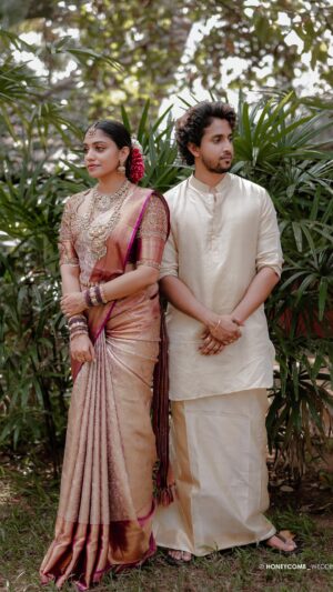 Saranya Nandakumar Instagram - Starting a beautiful new chapter together. Grateful for all the love and support as we embark on this journey. Your blessings and prayers mean the world to us as we build a lifetime of love and happiness. 💍✨ 

Dop: @honeycomb_weddings_ 
Wedding saree: @pothyskerala 
Groom hairstyle and makeup: @abhijith_laflare_makeupartist 
Decor: @luminor_events_and_designs
styled by: @amritha_lakshmi___  @ka_styling_house 

#NewBeginnings #ForeverAndAlways

[ wedding day, saranya nandakumar, saranya wedding ]