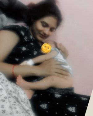 Sradha Panigrahi Instagram - It’s 3am, mama..
and I’m in your arms again.
I was restless. 
searching,until you lifted me close...
Your eyes are heavy and your head tilts back, but I know you’re awake.
You hold my back,
checking on me 
I check on you too, mama.
I know its hard at 3.ooam.
When the world is still, and daddy’s snorés.
And its just  us in the dark and the quiet .
But this?
This is my best time.
When the light is low and
your warm milk is all i know.
So I nurse a little slower, Nestling closer,
My hand curled around your finger
And there is it again -
The heartbeat i know , I hear it best at 3:00am.
 Yours #KoKo ❤️