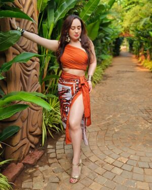 Stephanie Timmins Instagram - Channeling my inner island goddess in this tropical look 🧡🌴🌞🍊 @a.la.modebyakanksha 
Swipe to see a magical sunset & my go-to beachside cocktail 🍹🍹

( Swimwear, resort wear, swimsuit, sarong, Beach outfit, Beach look, Goa resorts, Morjim Beach)
#swimwear ##swimsuit ##resortwear #BeachDress #beachfashion #Goa #Goadiaries #morjimbeach #travelinfluencer #indiantravelinfluencer #feistyfoxtravels #feistyfoxdiaries
