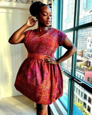 Wunmi Mosaku Instagram - I definitely acted a fool when I saw myself on a billboard in Times Square! Lost an earring jumping around so much 🤪
 #Passenger on @britboxtv 

Dress designed by Me 🥰 and made by @alef_byati
Styled by @shameelahhicks
💇🏿‍♀️ @cheryltbergamyhair
💄 @killahcamz