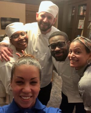 Adrienne Cheatham Instagram - Tuesday night was magical! (And made me miss being in restaurants 🥲) I’m so honored to have been a part of this event for the @jacquespepinfoundation and @beardfoundation sharing a kitchen with @lerouxeddy @danielboulud @chefgabrielkreuther @jacquestorres 

Our host @marvasmalls brought together an incredible group of people around the table that are all excellence personified and it was an honor to cook for them (during Black History Month no less). 
Sharing space with the chefs from all the teams, working collaboratively and seeing how much we all have in common was a joy. A special THANK YOU to @lana_cooks for coming straight from the airport to be there with me making sure things went smoothly, @jbfizabela for running the evening so well, and the great students from @iceculinary Abe, Nyaira, and Marven who came with open minds and good vibes to assist and soak up the experience. 

***For those of you who voted in the outfit poll, I went with Option 3 - the blue work jacket look for prep and set up, then did a costume change for service into Option 1 - the classic, crisp white jacket and apron! It felt right and was perfect for the situation. 

#chef #cheflife #jamesbeardhouse #blackhistorymonth