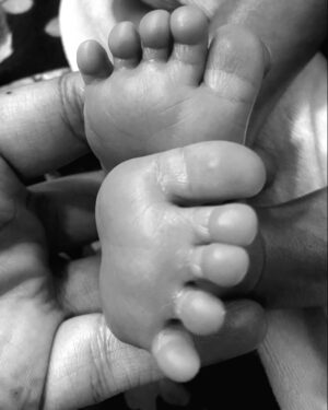 Akshya Digital Diaries Instagram - For all 9 months I dint believe I was carrying a tiny human. I couldnt believe till I dont heard my baby's heartbeat.
Pregnancy was tough yet smooth. I was shivering on the OT table but after sometime I couldnt feel shivering also. Just after 10 mins I heard you crying and I started crying on the table hearing your first cry. My heart was numb and Felt overwhelmed! 👩‍🍼
Our hearts are full, hands are small and these tiny fingers🧿🥺 
Welcome to the world my son! ♥️🥑 
.
You are the superhero for us - Mom & Dad ♥️🧿
.
#momdad #momlife #momblogger