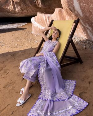 Anmol Baloch Instagram - Crimson Lawn’s latest collection.🌊🦚Inspired by timeless artistry and reimagined for the modern woman, these designs are crafted to make every moment feel like a statement. Because lawn should be as bold, beautiful, and effortless as you. #crimsonlawn2025 

@crimsonpakistan 
@tauseefahmed.official