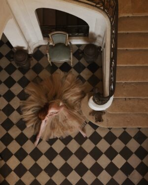 Courtney Halverson Instagram - Some days, I feel like a ballerina mid-spin; dizzy and weightless, uncertain if I’ll land gracefully or tumble. The world blurs at the edges, my eyes searching for something steady - but I think I must have forgotten to pick a point to hold on to. And everything tilts, the floor feels far - too far, and I’m not sure if I’m still dancing or just trying not to fall.

Maybe I need to remind myself that I’m still learning to find my own stillness in the whirling, to tell myself that every dancer must falter before they find their balance again. That grace does not come from never losing your footing, but in the way you pick yourself up after the fall.

Musings on feeling a bit off-balance as of late - something I know I’m not alone in. 🩰 | I’m calling this little series ‘a fallen ballerina’ featuring a dress from @montsand_official, as captured by @krystal_bick at Château Marcellus. 
.
.
.
#romanticstyle #feminineenergy #afallenballerina #movielike