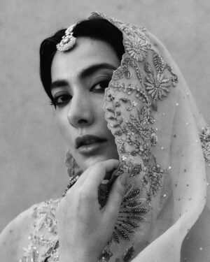 Eman Suleman Instagram - Suneeta Rao is an exceptionally beautiful woman with an equally beautiful voice. I fell in love with this song the first time I heard it, as a child, watching my older cousins twirl to its rhythm. They were dressed in matching angarkhas, each adorned with gotay ka kaam, but in different colors. Im still upset I didn’t get to wear one, I was very little, it didn’t matter. 
Toshi appa (@natthedevil) always finds the best music to dance to on menhdis. 
Anyhow, a friend called me a paree when I shared this picture, and the song has been etched in my mind ever since. 

@zarashahjahanbride photographed by @snaqvi 
Hair and makeup by @sunil_mua 
Styled by @yash645 
Art direction by @hashimali90