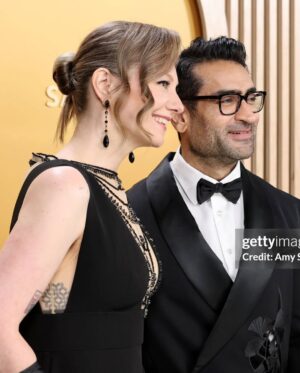 Emily V. Gordon Instagram - So so proud of @kumailn for winning a SAG Award yesterday for @onlymurdershulu! 

Hair: @stevenmasonlife 
Makeup: @nicolewittman

And for the people asking, the tat on my side in slide two is a pattern of what antibodies look like, designed and tattooed by @chaos.symmetry. My body doesn’t make them, so I thought getting them tattooed on myself was appropriate.