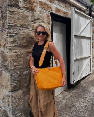 Georgie Gardner Instagram - Unashamedly thrilled to show off my new Urban Traveller @murphandmurph & super proud to support my beautiful friend Anna who’s built this business with her sister Catherine from scratch! If you choose one bag this season make it a @murphandmurph & how good is tangerine?! @davidcampbell73 on vocals obviously! #supportlocal
