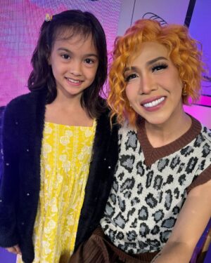 Helga Krapf Instagram - The face you make when you get to experience mommy’s old stomping grounds. 😍 

Amelie has been so curious about my life as an actress, asking so many questions about behind the scenes, in between takes, interviews, and the whole acting process. She asked if she can watch @itsshowtimena when we visit PH and her Ninong @augustbenitez granted her wish like a true fairy godfather. 🪄🤭 Thank you so much Sir August! 🙏🏼

Thank you also to her Ninong @teddspotting na pinaghandaan ang german, shooked si Amelie sayo! Lol Also to her Ninong @vhongx44 for seeing her backstage. 🫶

To Ninong @thirdeeduran , Tita @alyannaaranezz and Tito @deanscenes for coming and vlogging (follow niyo siya sa tiktok 🤣) 

And to the staff and kuyang marshalls of Abs who are as respectful and kind as I remember them to be. Truly felt like coming back to your former home. 🏠