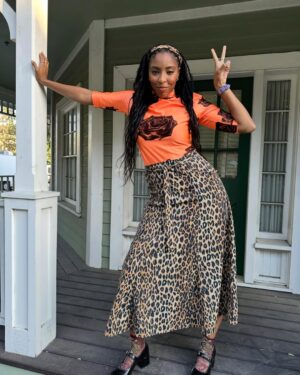 Jessica Williams Instagram - By popular demand , how to look like everyone’s favorite therapist bestie, Gaby! I’ll continue to break down both Liz and Gaby’s looks from Season 2 for anyone who wants to dress like our #SHRINKING style icons 😊👗

Shirt : Vintage Thierry Muglar 
Skirt : Damson Madder 
Shoes : La Bucq 
Socks : Sock Candy