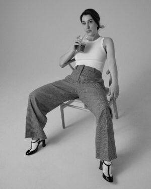 Joanna Hausmann Instagram - I call this series “Masking my iced-coffee induced panic attack by trying to look cool and apathetic.”

. (📸: @osvaldoponton 👚/ styling: @martiarcucci / 💄: @wakana1107 )