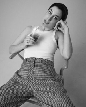 Joanna Hausmann Instagram - I call this series “Masking my iced-coffee induced panic attack by trying to look cool and apathetic.”

. (📸: @osvaldoponton 👚/ styling: @martiarcucci / 💄: @wakana1107 )