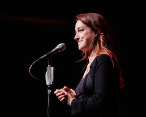 Joanna Hausmann Instagram - Sappy post warning: I accomplished a live long dream of performing at a Moth GrandSLAM and felt so honored to be able to share a story about Venezuela, my family’s experience with political repression, oh and, um, the fact I got attacked by a literal bull on a ranch when I was 10! What a ride! Thanks to @annaeroberts and @gabrielszajnert for making it possible and @iampetercooper for the pics. So so humbled to share the stage with such remarkable storytellers! PS: I was told I couldn’t touch or move the mic and I was like “um I’ve never stood still a second of my life” but I did it 🩷