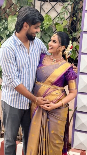 Kanmani Manoharan Instagram - Our hearts whispered a secret, and now it’s blooming for the world to see 🌸♥️🥰🧿 Amma Veetu #Poochootal done right 💯 
@aswath_official @aswathinkanmani ✨

P.S. Will update about our baby shower soon ♥️

Makeover : @jiyamakeupartistry 
Hairstyle : @mani_stylist_ 
Jewellery: @new_ideas_fashions 
Blouse : @zenoraofficial_ 
Sarees Drapist : @pleats_drapes 
Flowers : @redbridal_flowers 

#wearepregnant #aswathinkanmani #kanmanimanoharan✨ #vjaswath #aswathchandrasekar #happilyeverafter #littleonecomingsoon