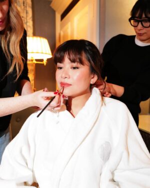 Katie Leung Instagram - GRWM for @bazaaruk (link in bio) celebrating the Year of The Snake with @huishanzhang and friends 🧧🐍🥰 

Dress: @huishanzhang 
Make up: @sarahillmakeup @lancomeofficial 
Hair: @ami.fujita 
Photo: @marco.bahler 

@publiceyecomms