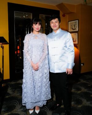Katie Leung Instagram - GRWM for @bazaaruk (link in bio) celebrating the Year of The Snake with @huishanzhang and friends 🧧🐍🥰 

Dress: @huishanzhang 
Make up: @sarahillmakeup @lancomeofficial 
Hair: @ami.fujita 
Photo: @marco.bahler 

@publiceyecomms