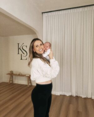 Katrina Scott Instagram - Carmen turned 2 months old today… and I’m pretty sure her first words will be KSL 🥹 The second and last slide are the first pics I took with her in my belly at 6 weeks 🤍 

I still can’t believe this wild ride. If you had told me we’d be building a fitness studio and launching an app while chasing after our two daughters— all while pregnant and bringing home a newborn— I would have thought I was dreaming. ☁️ From our positive pregnancy test to anxiously waiting for her heartbeat, her first kicks at the studio and creating the app, she’s been a guiding light for our family. 

Sometimes life’s biggest surprises end up being the biggest blessings. I am just so thankful for family, our daughters, to be teaching in the studio, Brian, and all of you 🙏🏼 

Happy 2 months baby Carmen ♾️