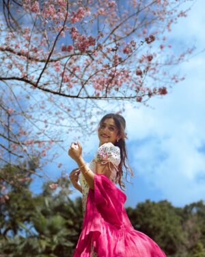 Larissa Dsa Instagram - Cherry Blossom in full bloom in 📍Shillong 🌸

I have been in Meghalaya for the past 10 days filming the next two episodes for @natgeoindia and I cannot wait for it to go live! 

Cant share too much on my stories or feed since it’s all a part of the project, so will share when the episodes come out 🥹🌸 

Thanks for the epic photos and company my gurlllsss @riddhibhattrb_ @ritika_jasmera 🥹🫶🏼🌸

Dress - @lovetrianglethelabel (got it from asos 4 years ago)
Jewels - @beyond.larissa (new collection 🥹coming soon)
Shoes - @cariuma
Pink Shrug - @fuss_pot 🌸