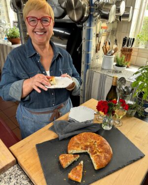 Lidia Bastianich Instagram - I live by the seasons. It’s just what feels natural to me. On Sundays, my grandma would bake a ricotta tart like this one. It was easy, fast, and always starred the spring vegetables from the garden.  This season on Lidia's Kitchen we’re featuring recipes, like this one, from my latest book - "Lidia's From Our Family Table To Yours". It’s a personal collection of more than a hundred of our favorite family recipes.  Check your local TV listings - and find a link to this recipe - here: link in my bio.  Buon Gusto!  @ampublictv  #LidiasRecipes #LidiasItaly #LidiasKitchen  #LidiaBastianich #ItalianFood #FromLidiasTableToYours #LidiasSoundtrack